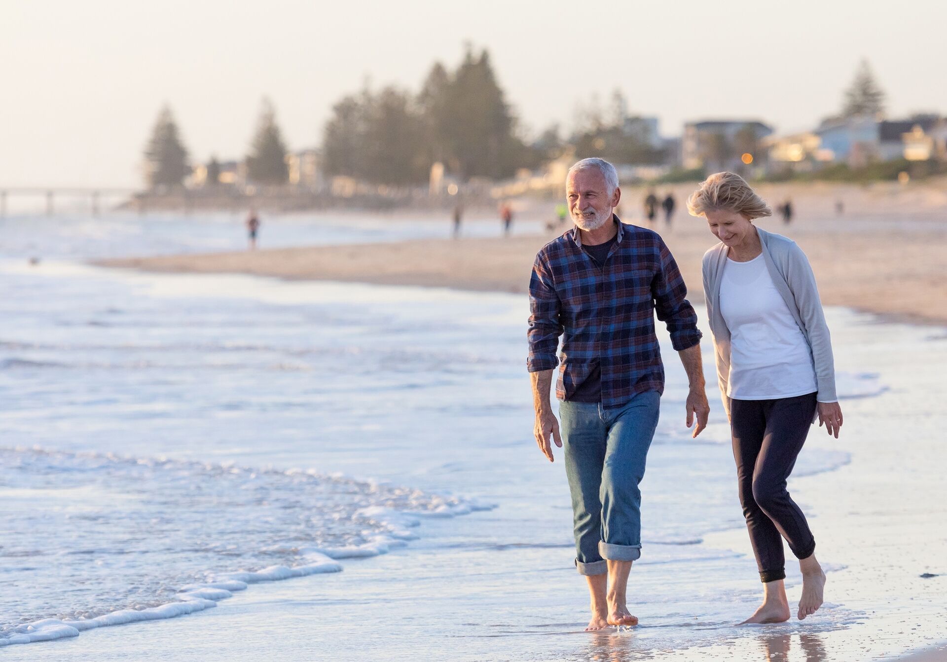 couple walking in tide