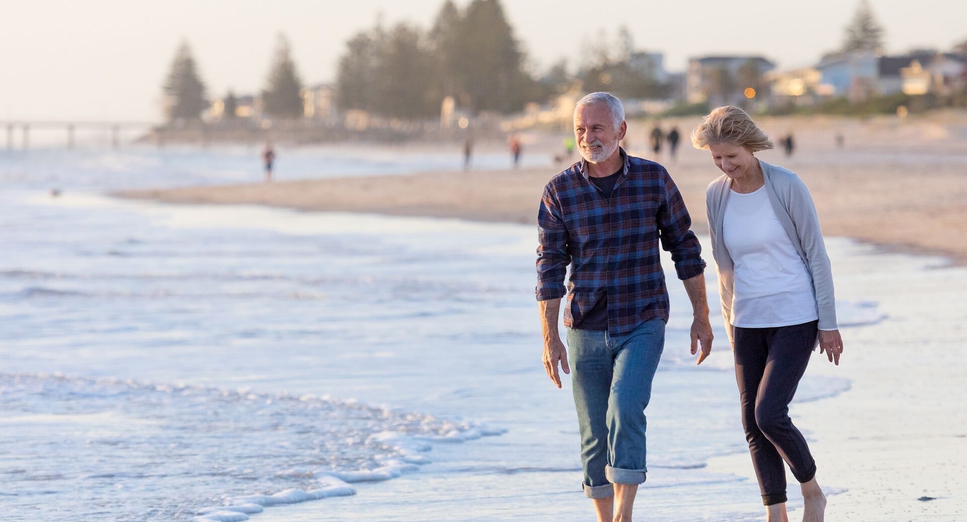 couple walking in tide